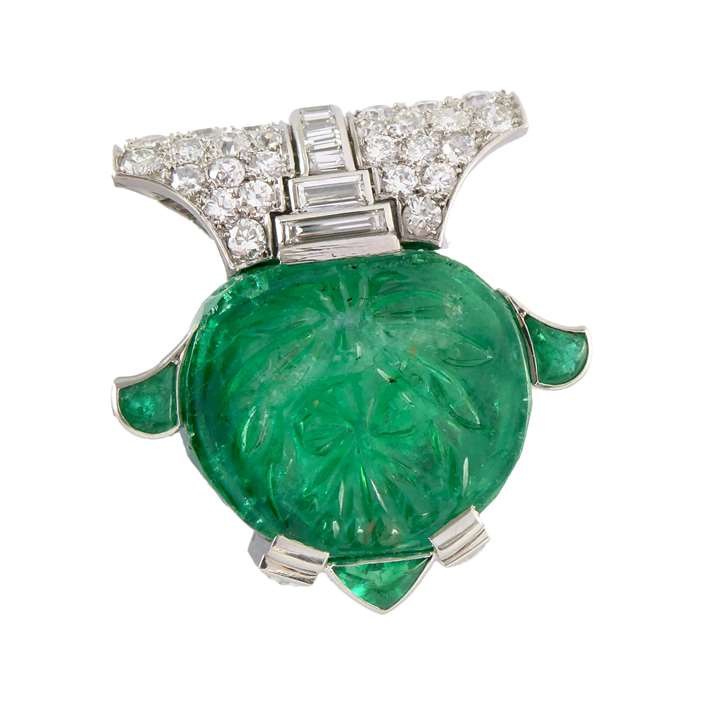 Art Deco carved emerald and diamond clip of Indianesque leaf form